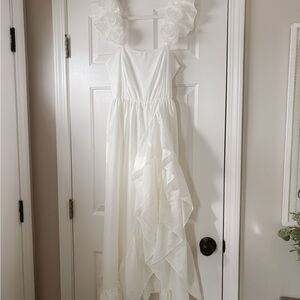 Storia White Dress with Ruffled Accents